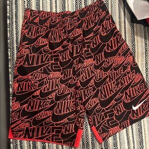 Nike Men's Athletic Shorts in Black and Red Print